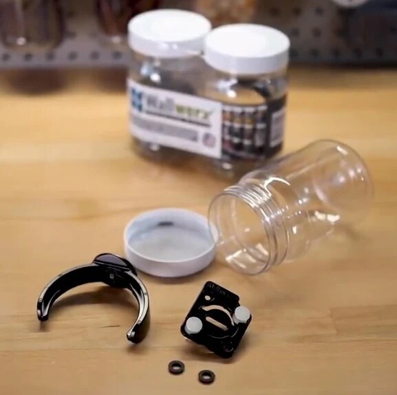 Pegboard jars, storage and organization system includes 12 plastic jars, also holds standard mason jars