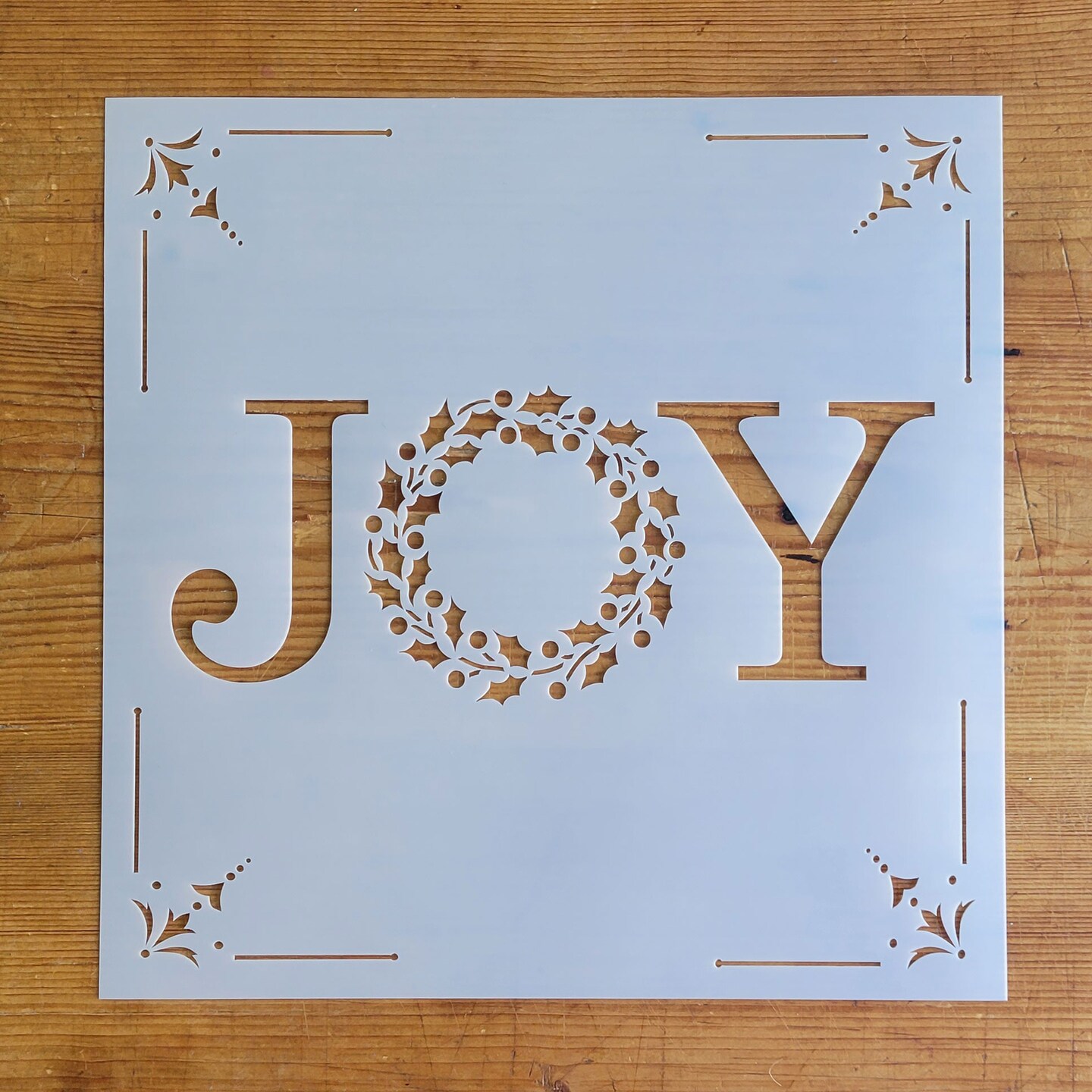 Joy with Holiday Wreath Embossing 12 x 12 Stencil | FS105 by Designer Stencils | Word &#x26; Phrase Stencils | Reusable Stencils for Painting on Wood, Wall, Tile, Canvas, Paper, Fabric, Furniture, Floor | Reusable Stencil for Home Makeover
