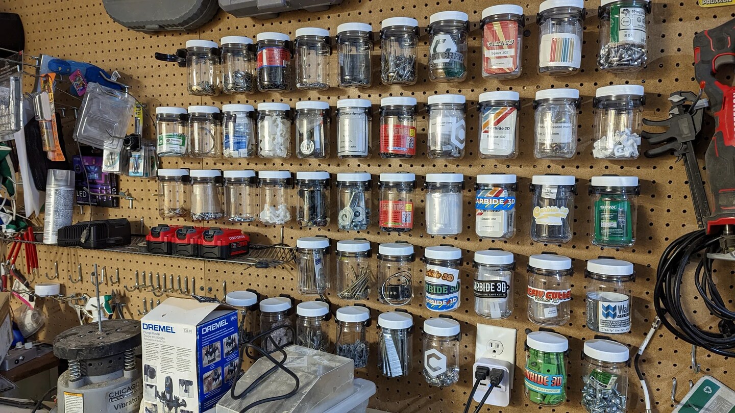Pegboard jars, storage and organization system includes 2 plastic jars, also holds standard mason jars