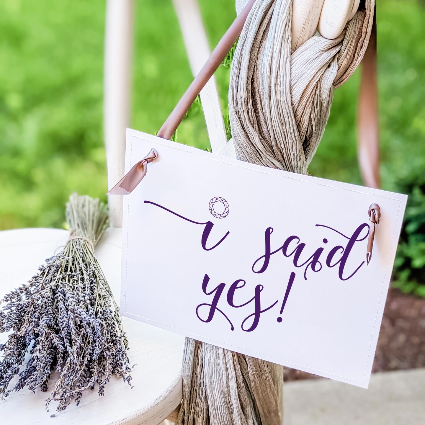 Ritzy Rose Engagement Announcement Sign - Dark Purple on 11x8in Ivory Linen Cardstock with Lavender Purple Ribbon