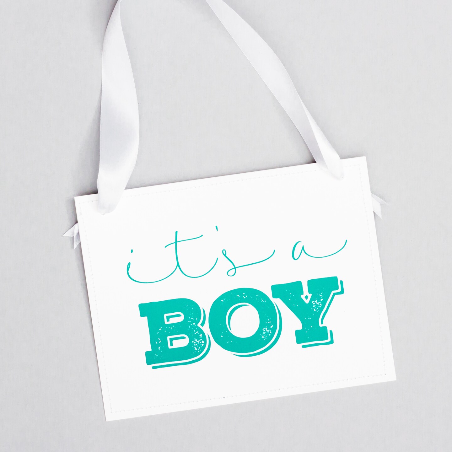 Ritzy Rose Gender Reveal Sign - Pink and Blue on 11x8in White Linen Cardstock with White Ribbon