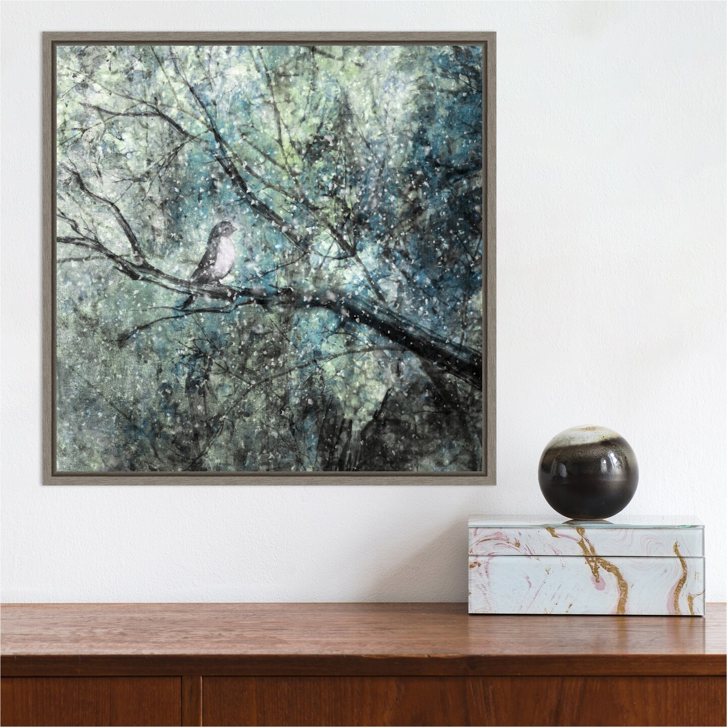 The Silence Of The Snow (Bird in Tree) by Delphine Devos 16-in. W x 16-in. H. Canvas Wall Art Print Framed in Grey