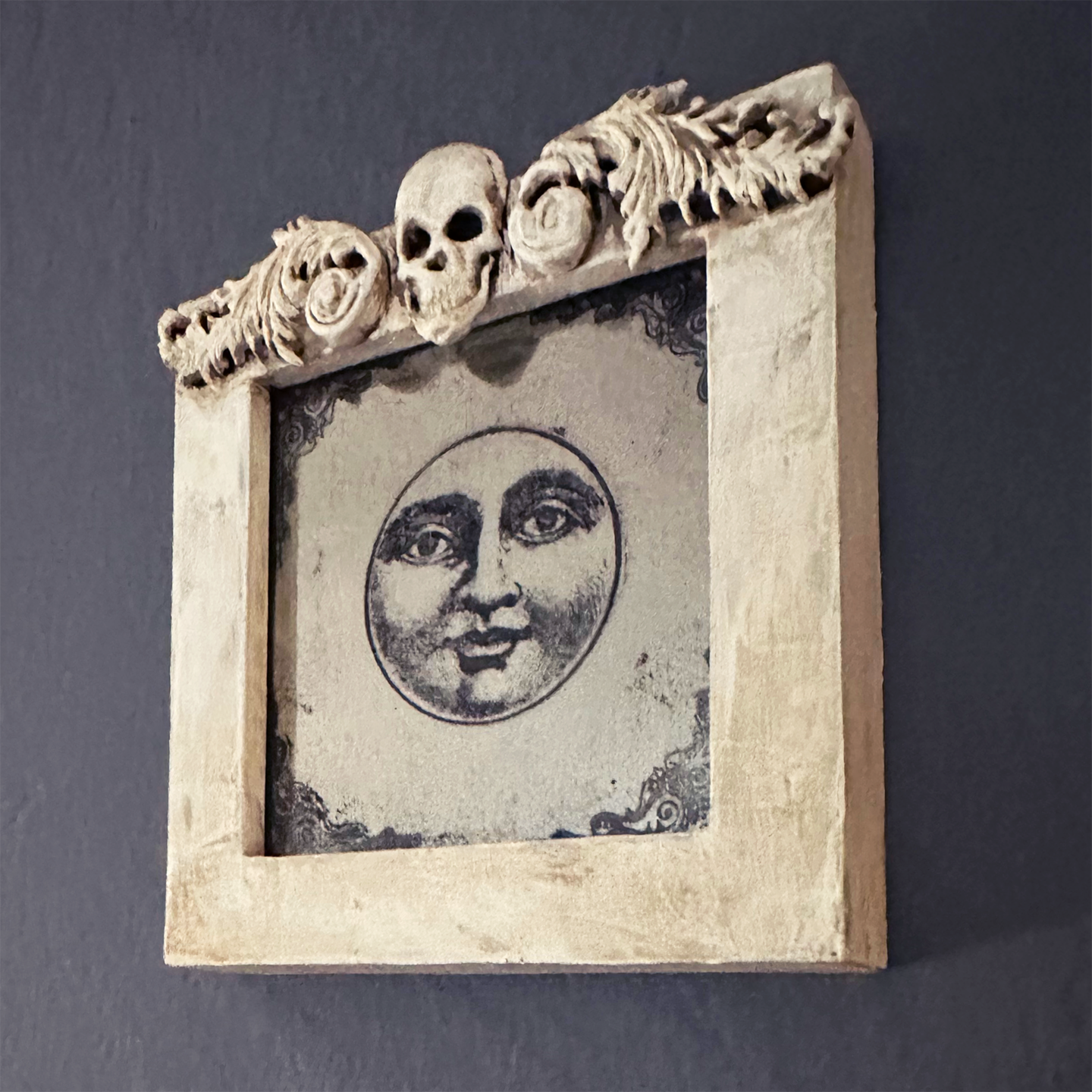 Man In The Moon Small Antiqued Mirror with Skull Embellishment and