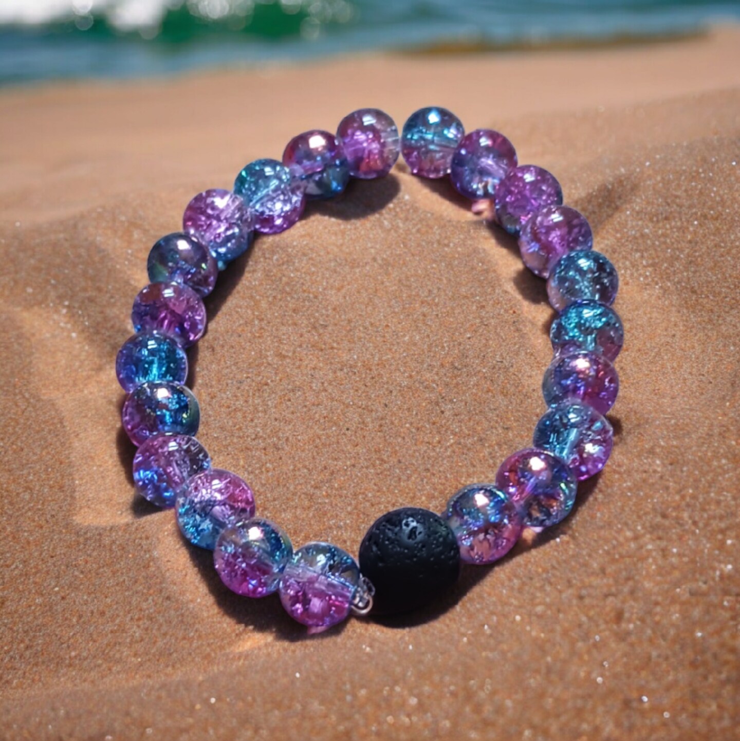 Black Lava Stone And Pink And Blue Quartzite Essential Oil Diffuser Bracelet | 2 in