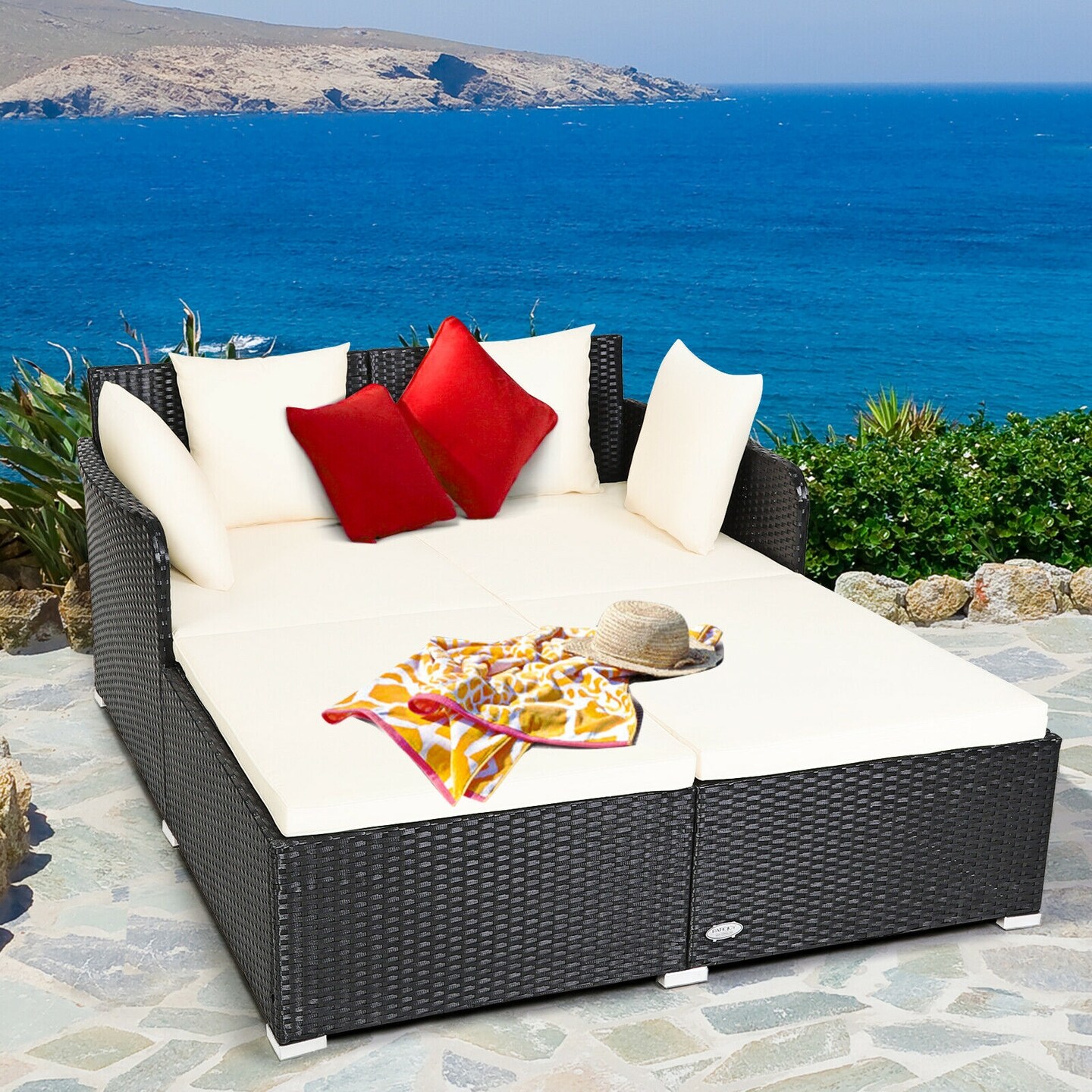 Spacious Outdoor Rattan Daybed With Upholstered Cushions And Pillows
