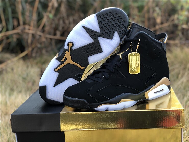 Jordan retro 6 black and gold on sale