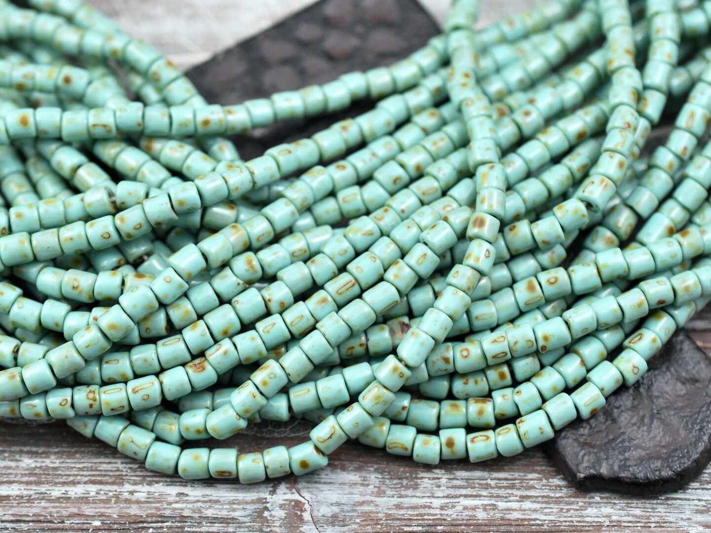 6/0 Aged Green Turquoise Picasso Bugle Beads