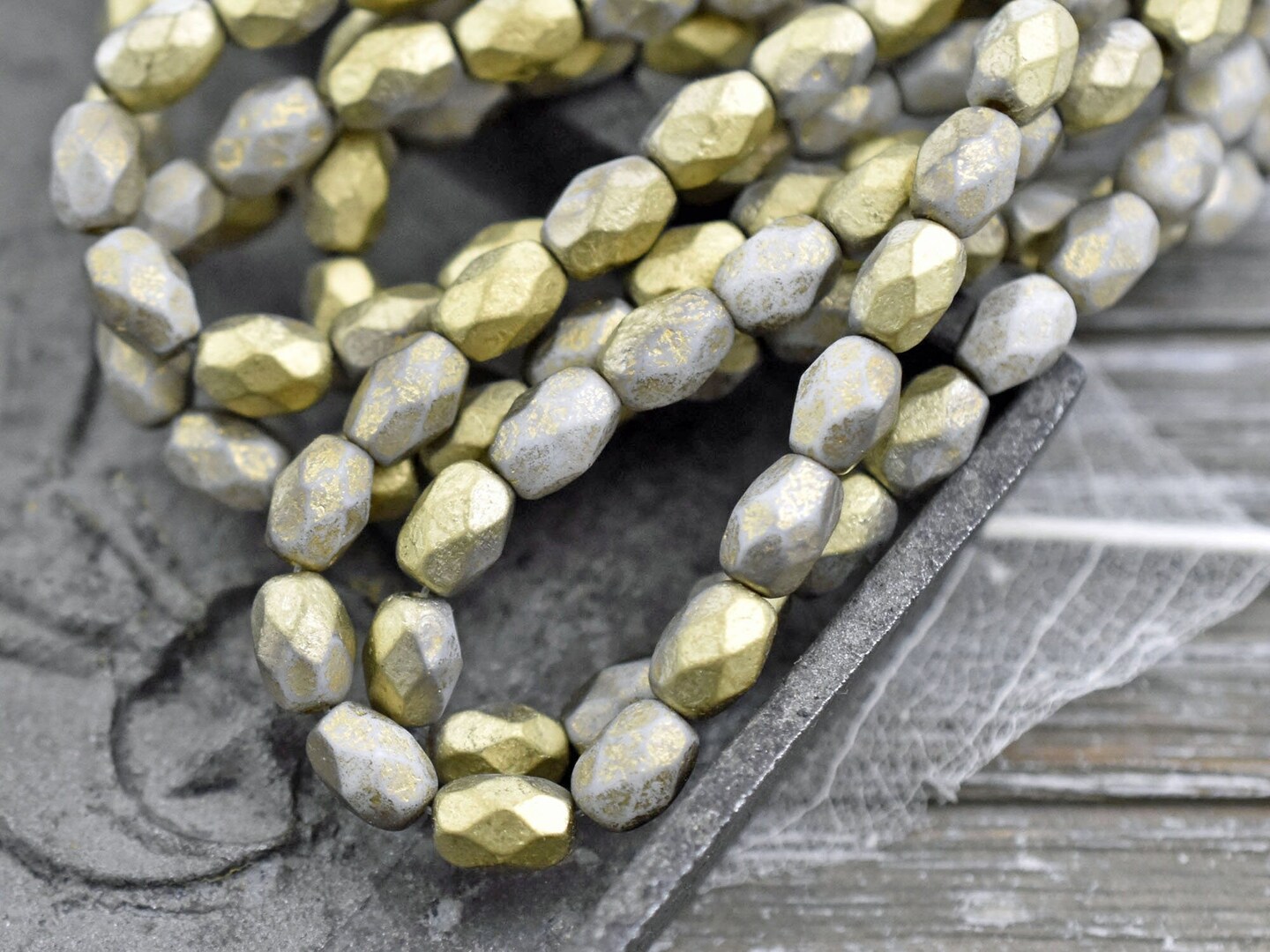 *20* 6x8mm Gold Washed Etched Ash Grey Faceted Oval Beads