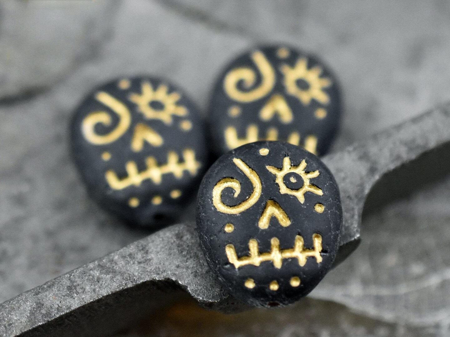 *4* 15x13mm Gold Washed Matte Black Voodoo Face Beads | Michaels