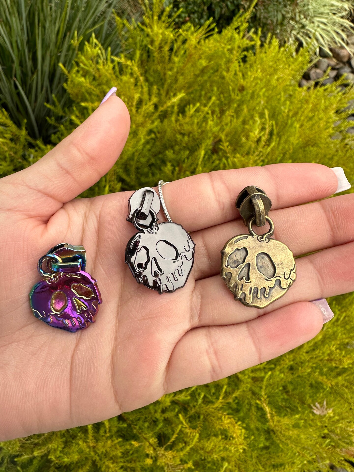 Poison Apple zipper pulls