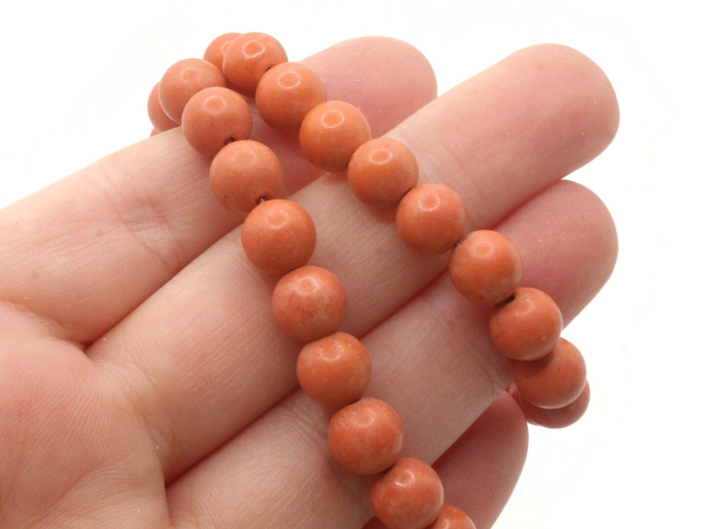 51 7mm to 8mm Round Dyed Orange Howlite Stone Beads