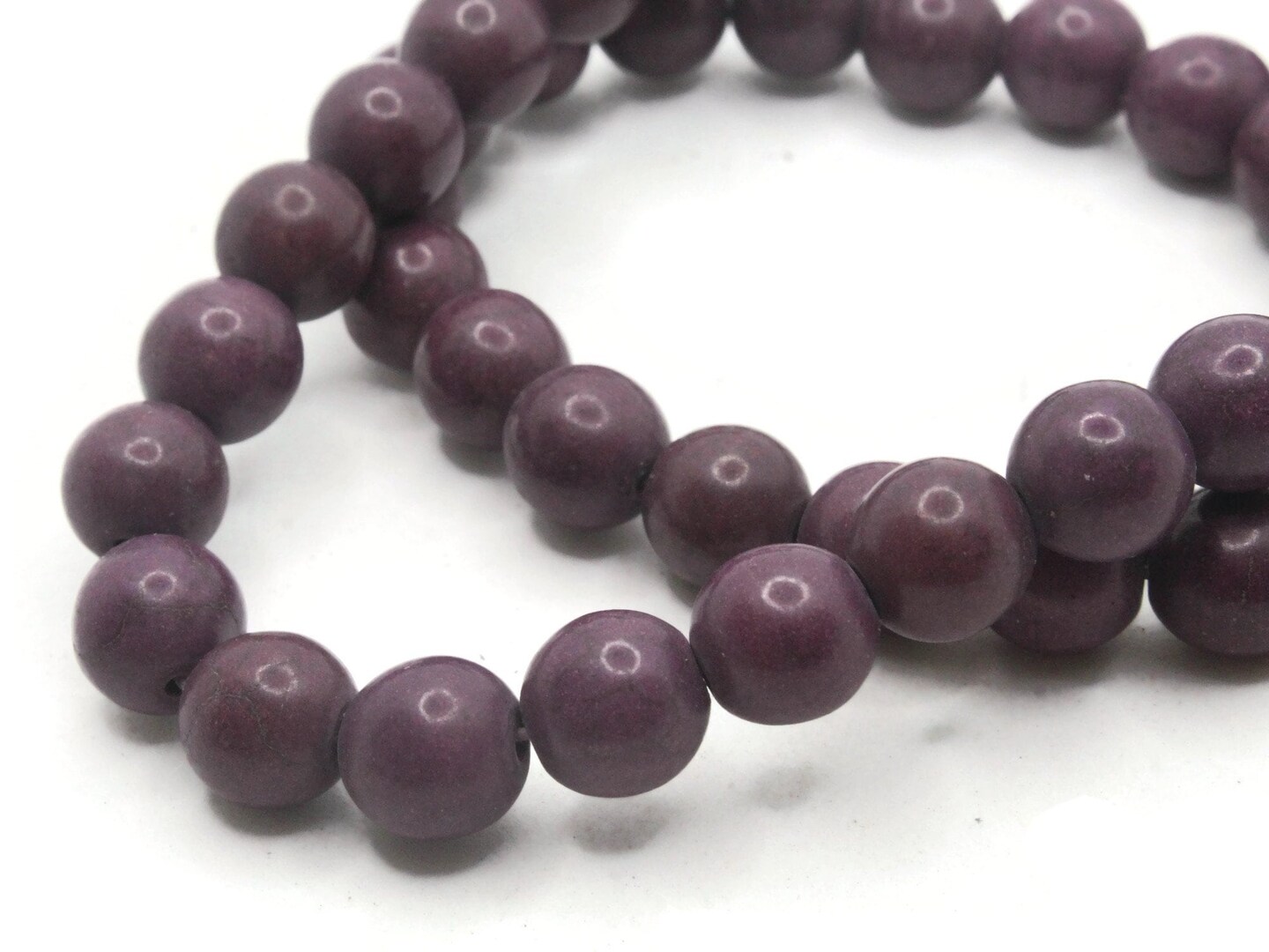 42 9mm to 10mm Round Dyed Purple Howlite Stone Beads