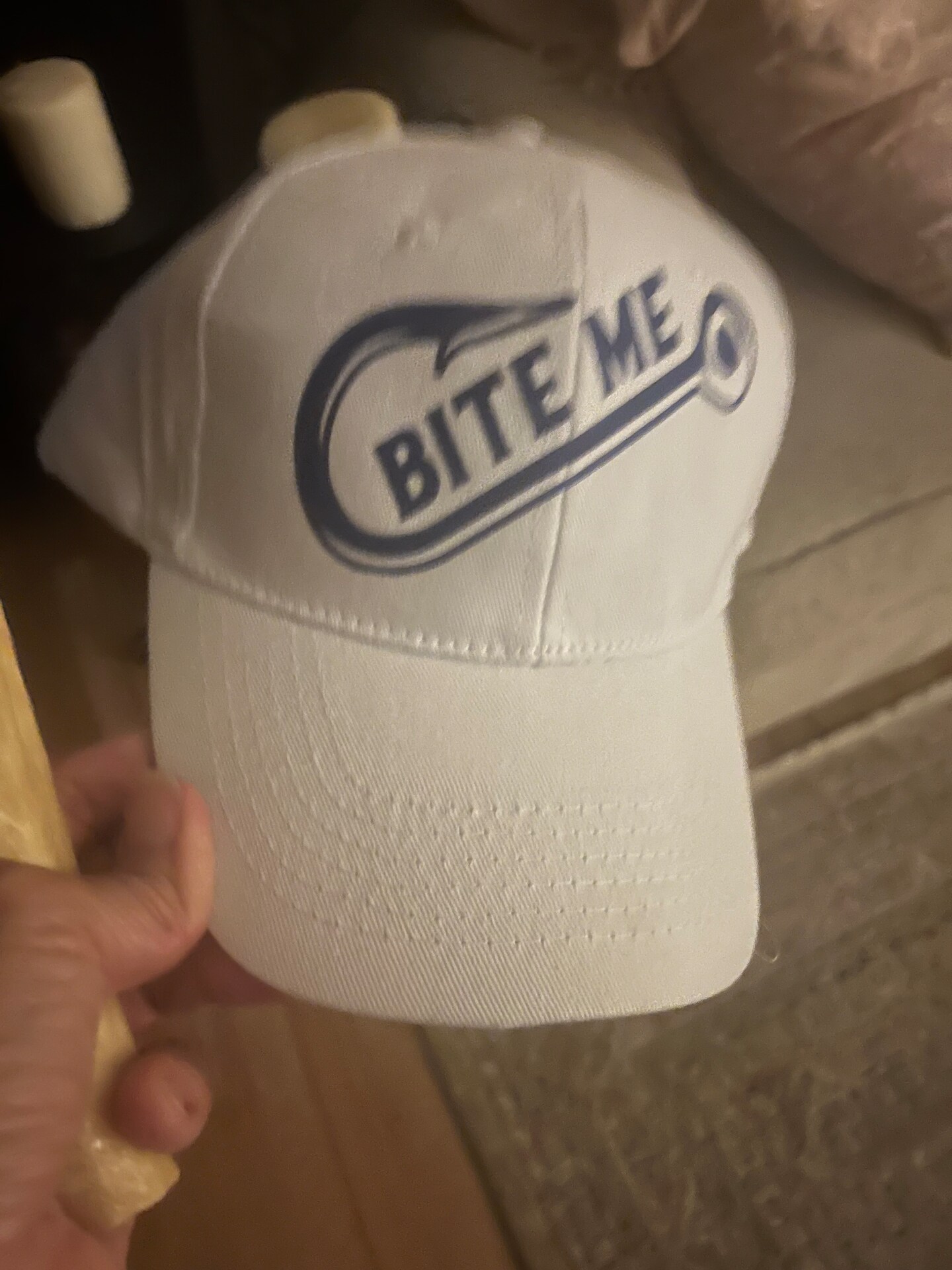 Bite me fishing hook baseball cap. Adjustable size, canvas cotton