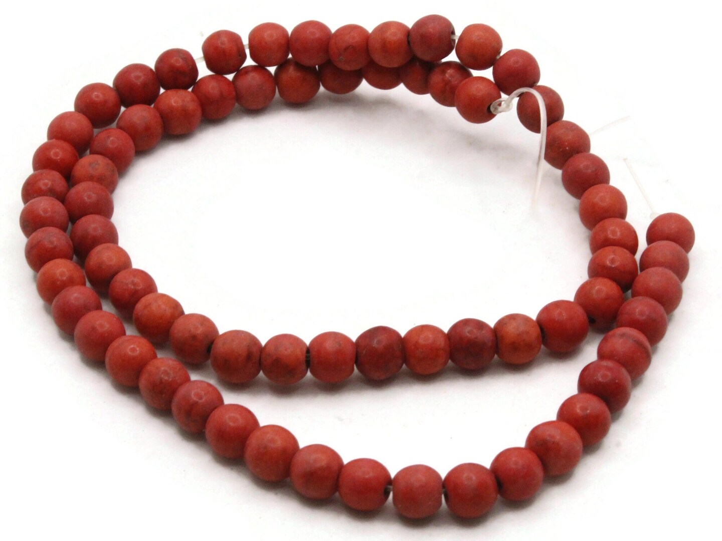 65 5mm to 6mm Round Dyed Red Howlite Stone Beads