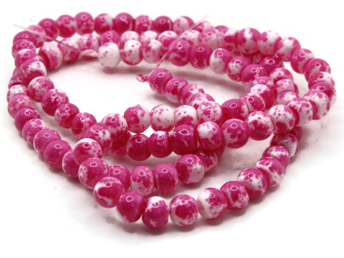 100 4mm White with Pink Splatter Paint Smooth Round Glass Beads