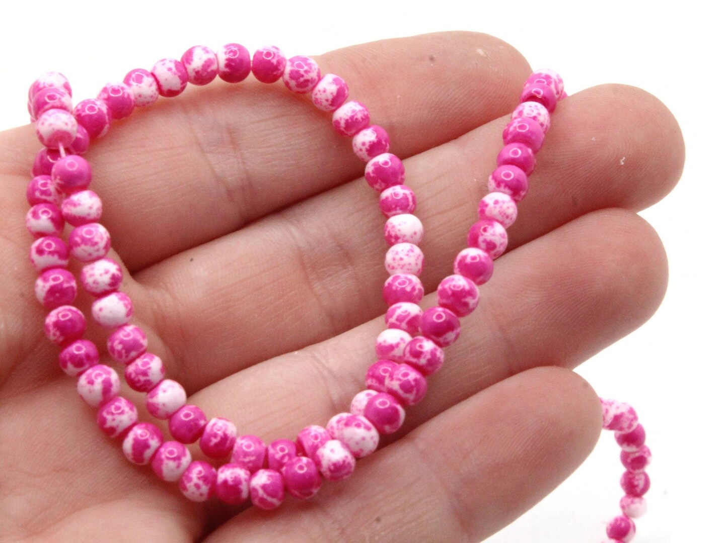 100 4mm White with Pink Splatter Paint Smooth Round Glass Beads