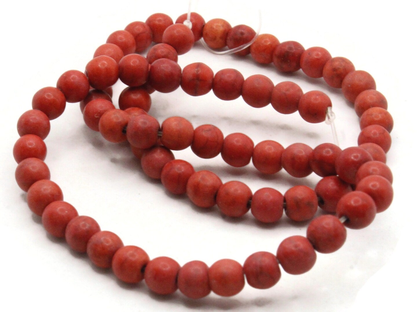 65 5mm to 6mm Round Dyed Red Howlite Stone Beads