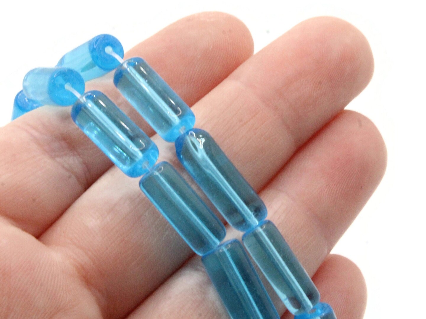 22 15mm Clear Sky Blue Glass Tube Beads