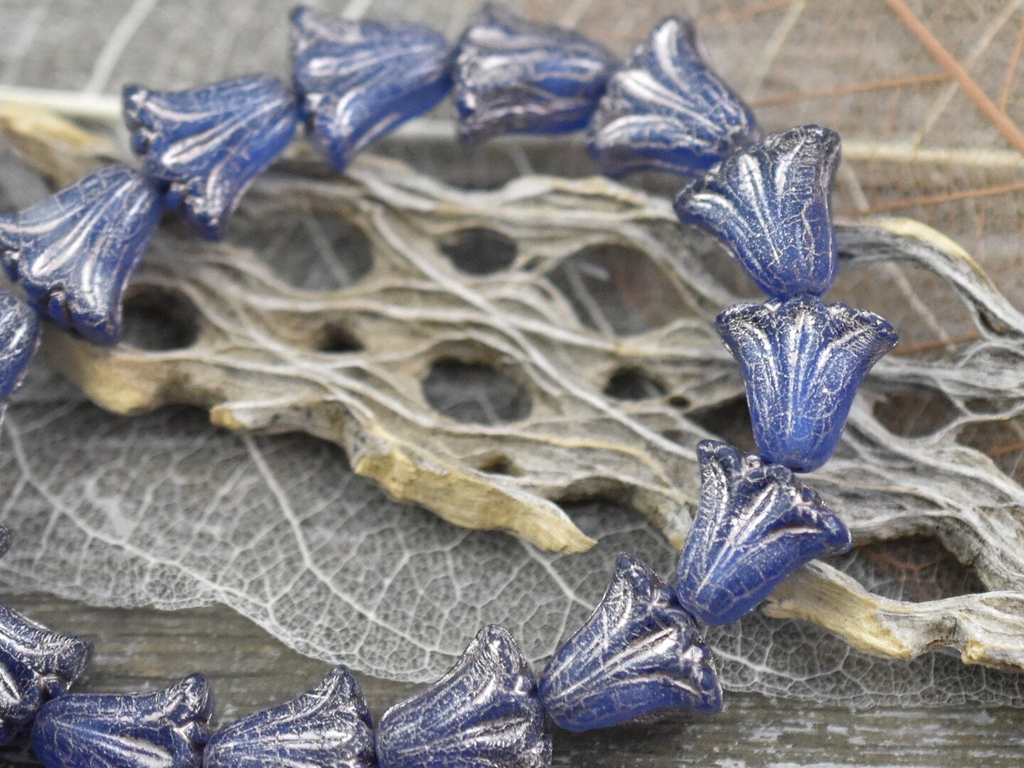 *15* 9x10mm Platinum Washed Matte Deep Blue Lily Flower Beads