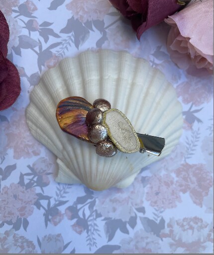 A pair of mussel shell hairclips / brooches with hotsell Swarovski crystals, beads, gems and chunks of amethyst.