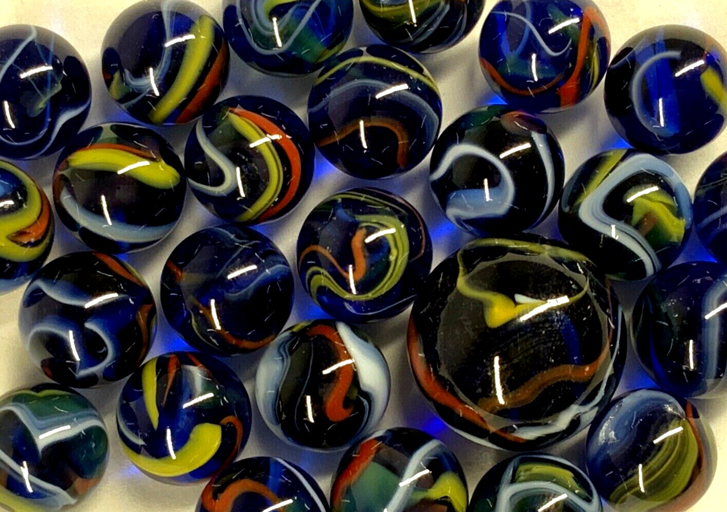 25 Glass Marbles ECLIPSE Cobalt Blue Red Yellow Transparent Shooter