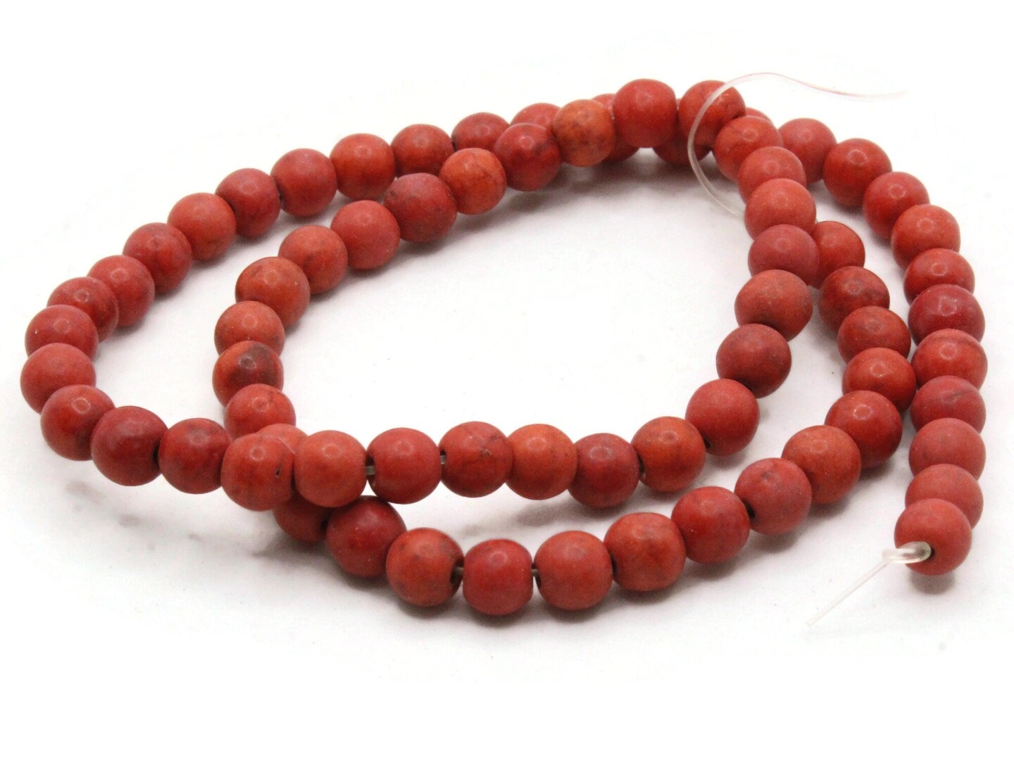 65 5mm to 6mm Round Dyed Red Howlite Stone Beads