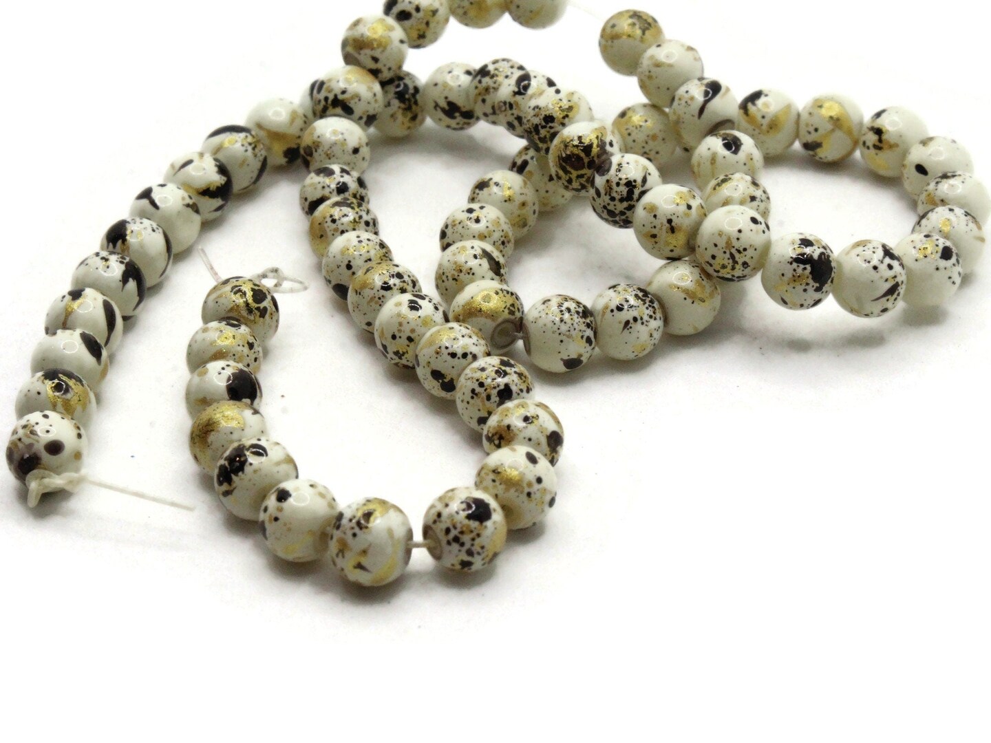 68 6mm Ivory, Gold and Black Splatter Paint Smooth Round Glass Beads