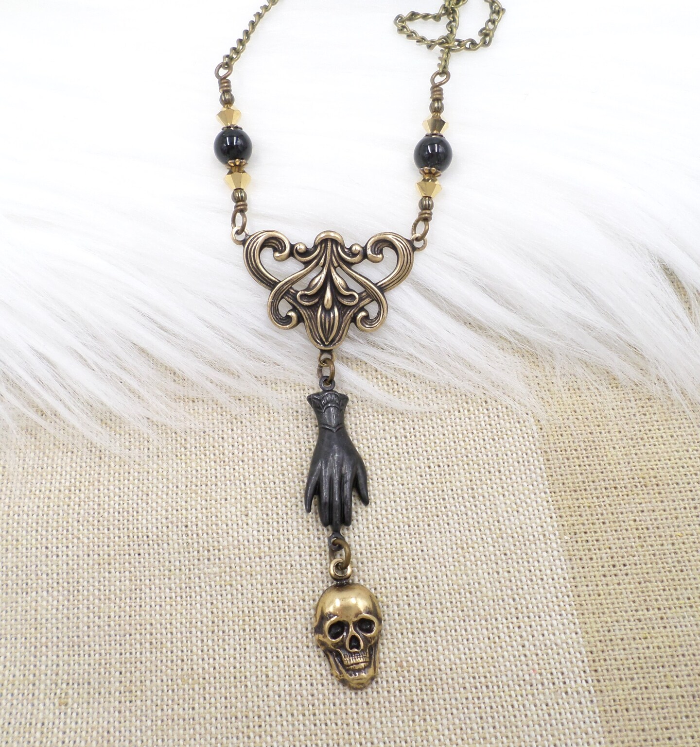 Black hand deals necklace