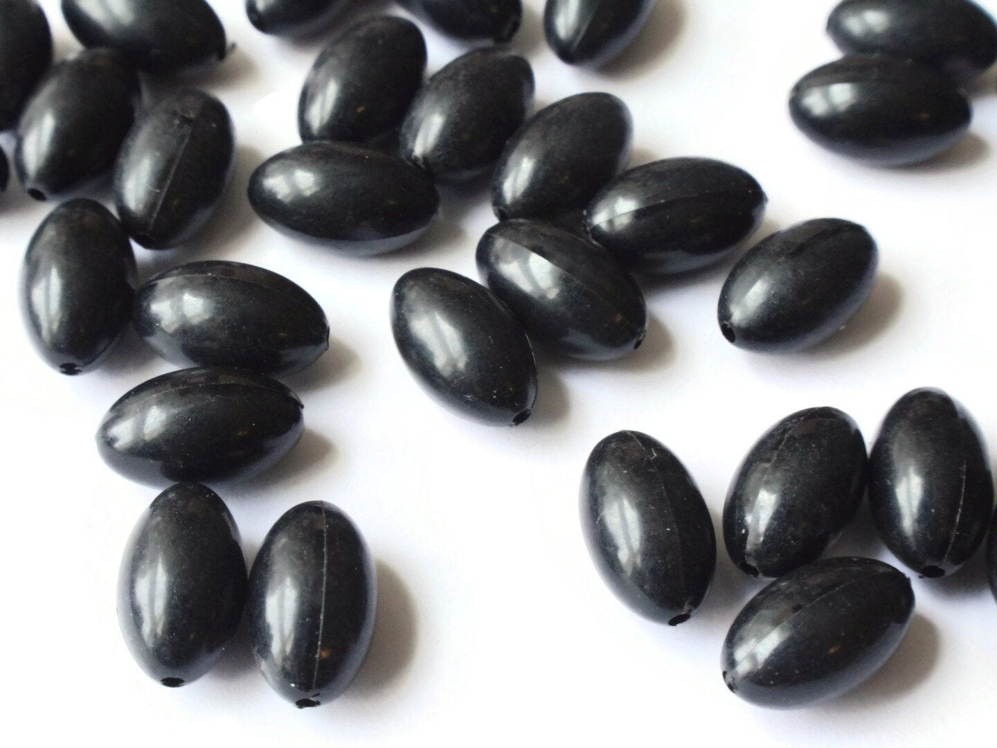 50 12mm x 7mm Smooth Oval Black Plastic Beads