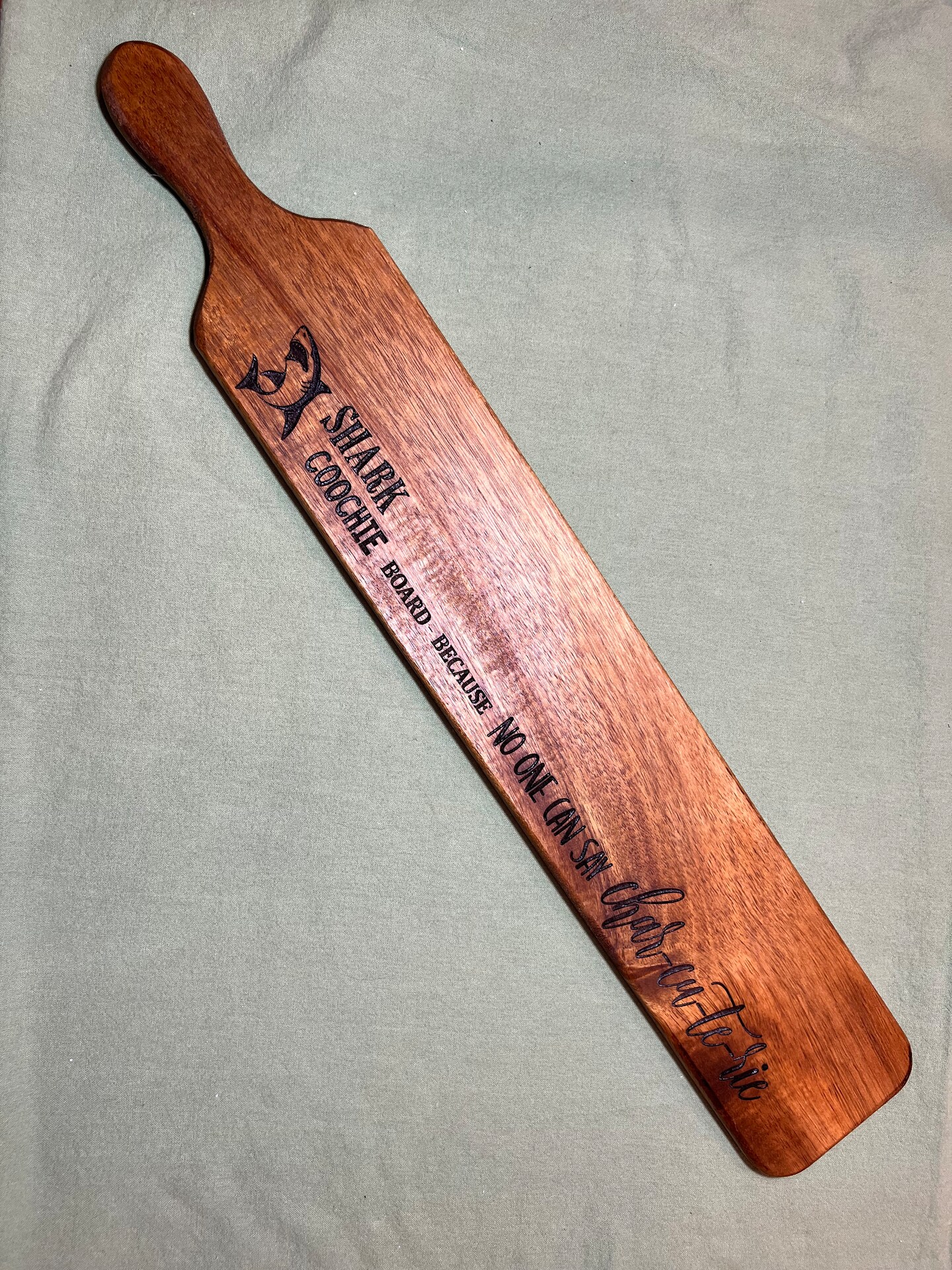 “Shark Coochie”. Engraving on acacia charcuterie board.