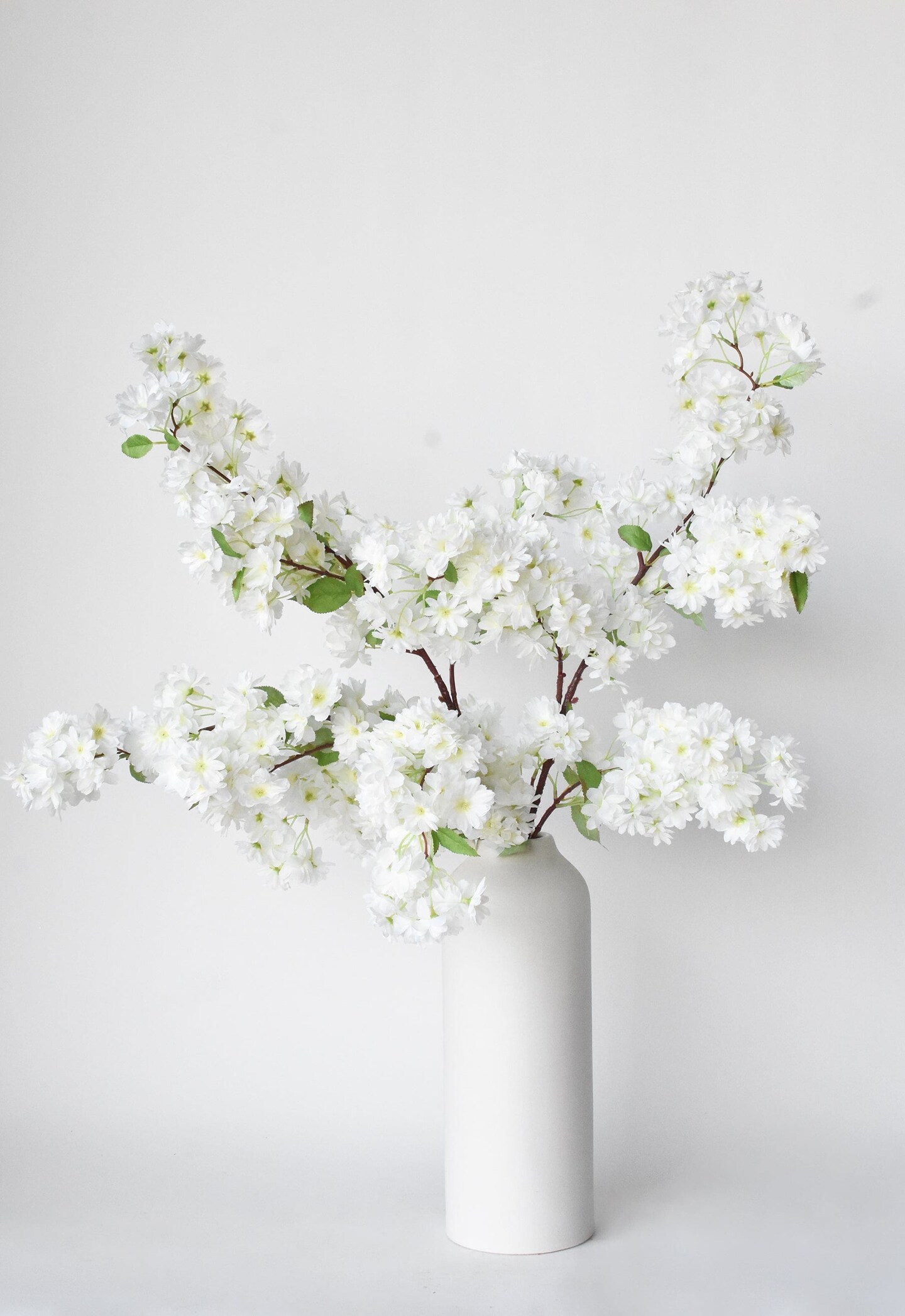 40&#x22; Faux Cherry Blossom Branch Stem Cream