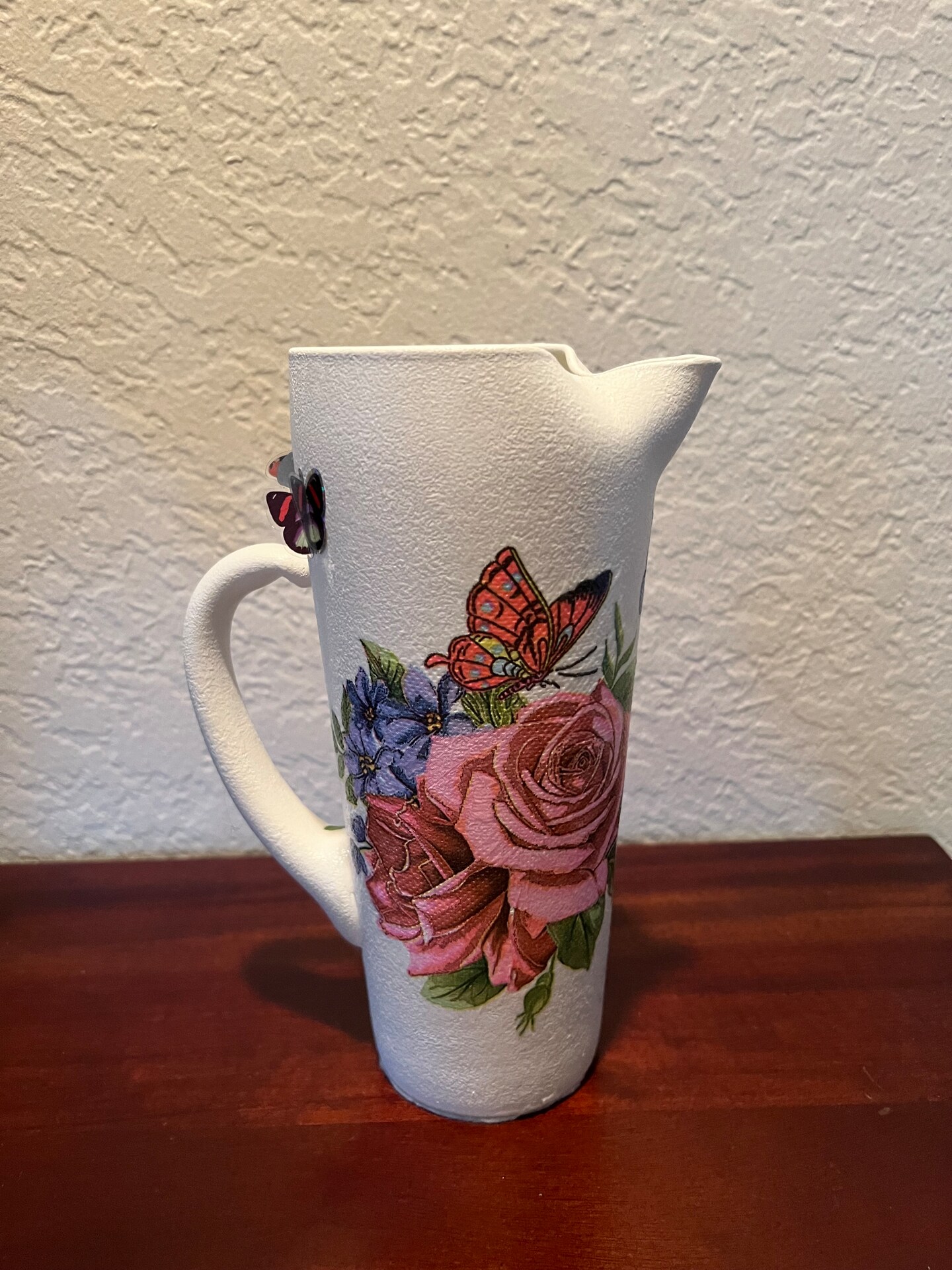 product name is Water Pitcher with Roses (Item 8)