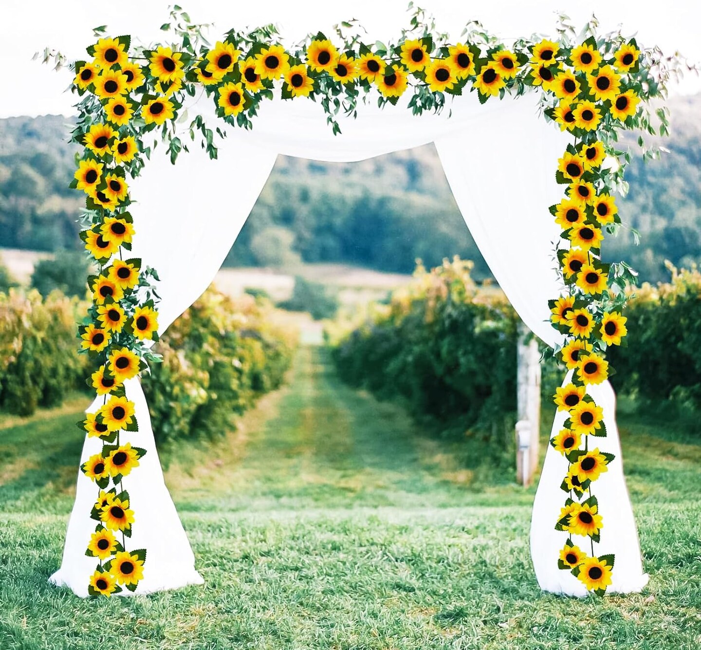 Three-piece 7.5-foot artificial sunflower garland with green leaves, perfect for home, kitchen, garden, wedding arch, bridal shower, baby shower, or outdoor decor. Made of silk flowers.