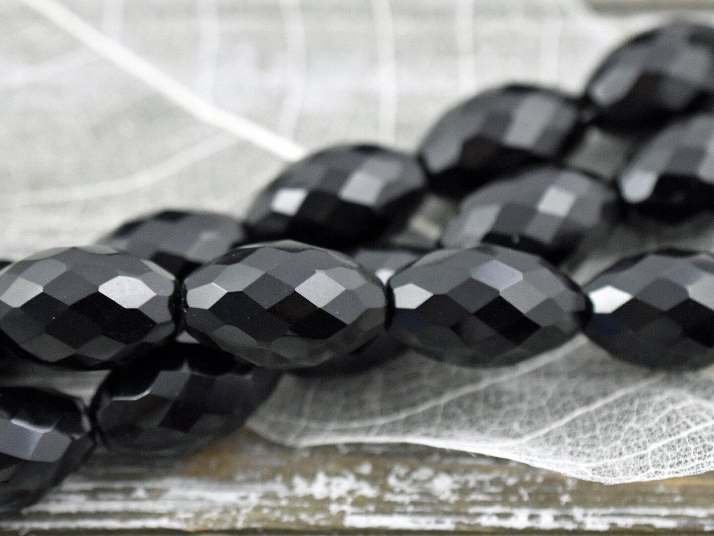 *6* 12x20mm Jet Black Faceted Oval Fire Polished Beads