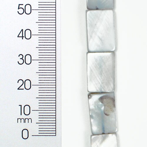 A 16&#x22; Strand of Gray Tinted Shell Beads 9x15mm