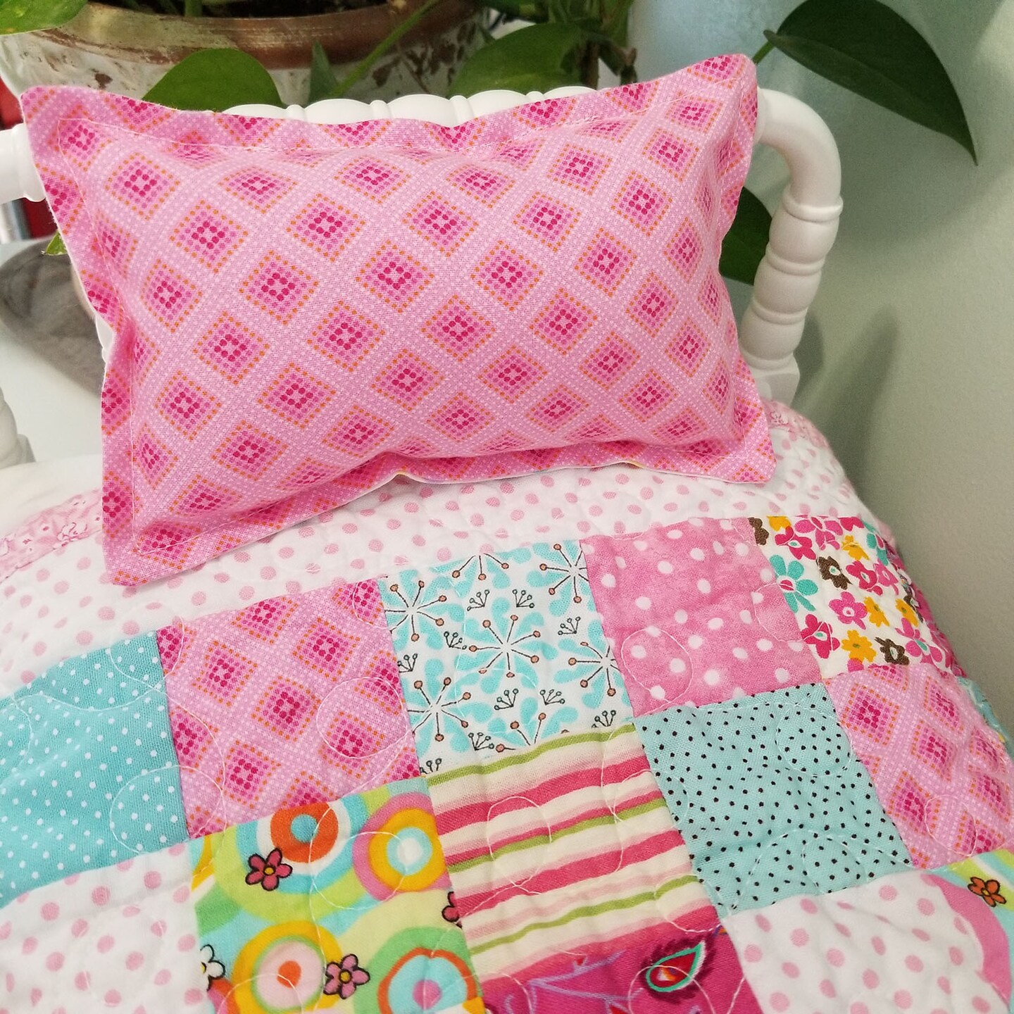 Pink quilted bed online throw