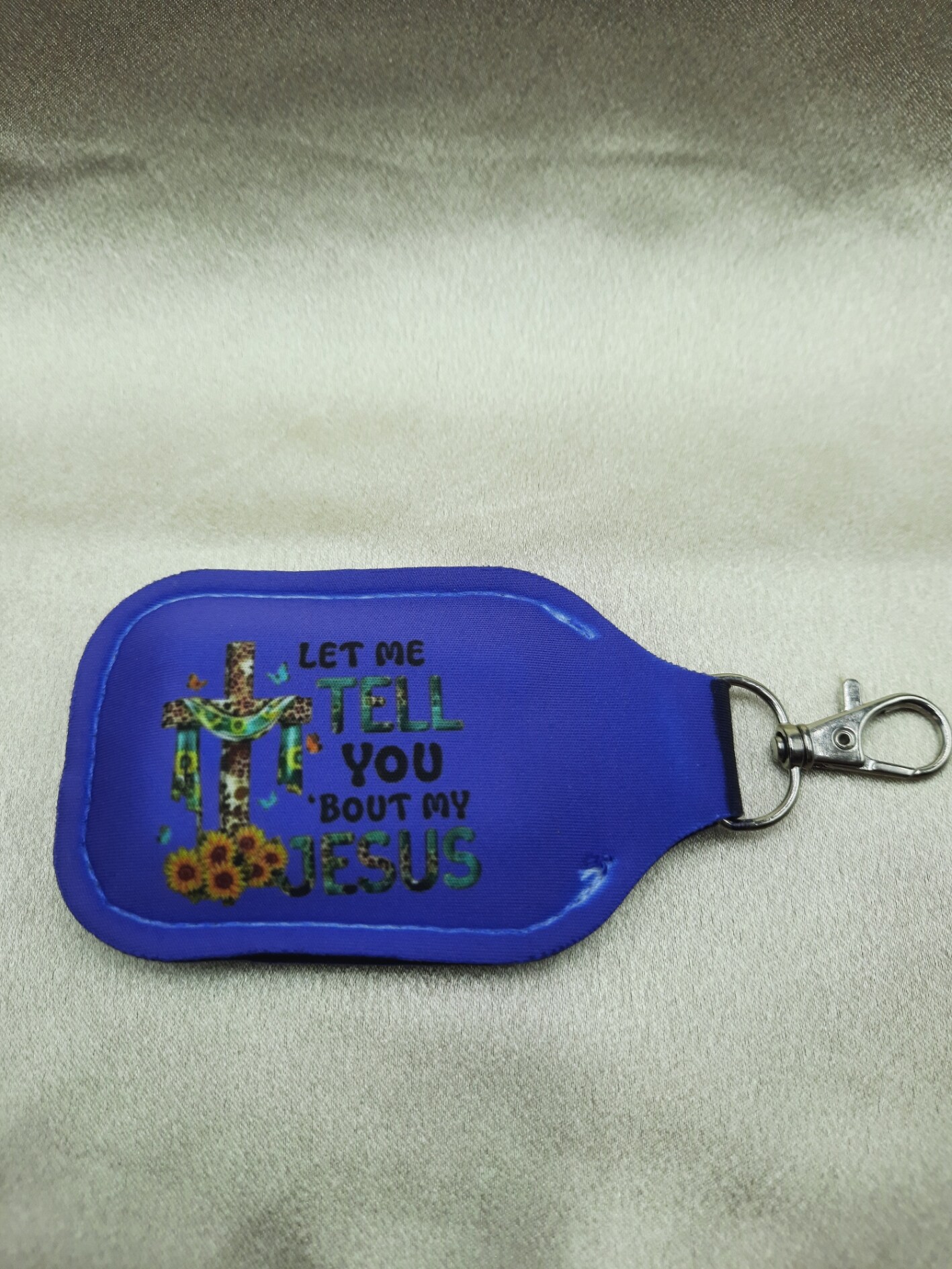 Clip on, flip top hand sanitizer, lotion holder MakerPlace by Michaels