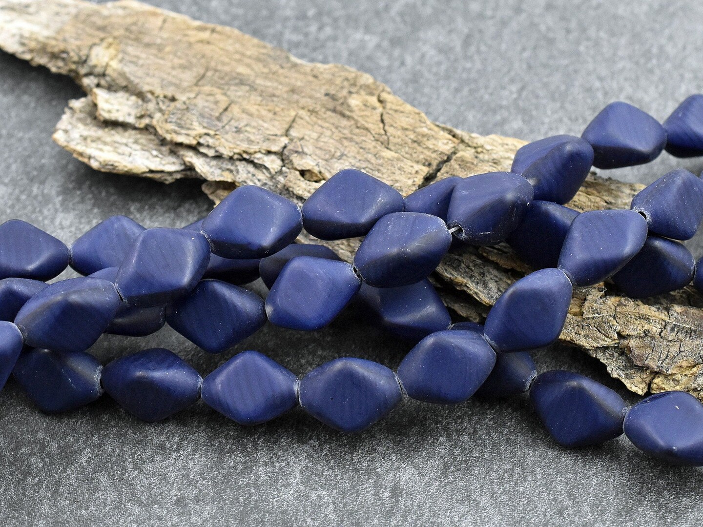 *13* 11x15mm Matte Navy Blue Tri Oval Beads