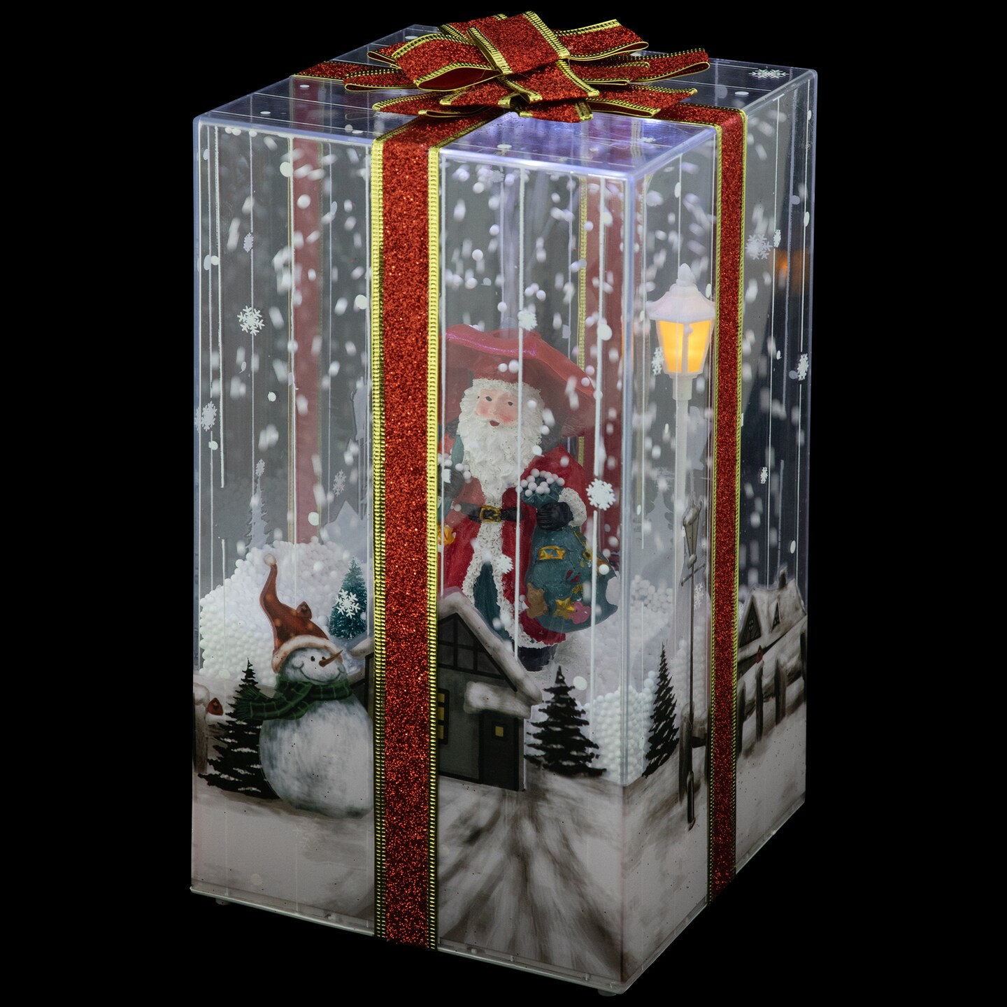 Northlight 12&#x22; Lighted and Musical Santa Snowing Gift Box with Red Ribbon Christmas Decoration