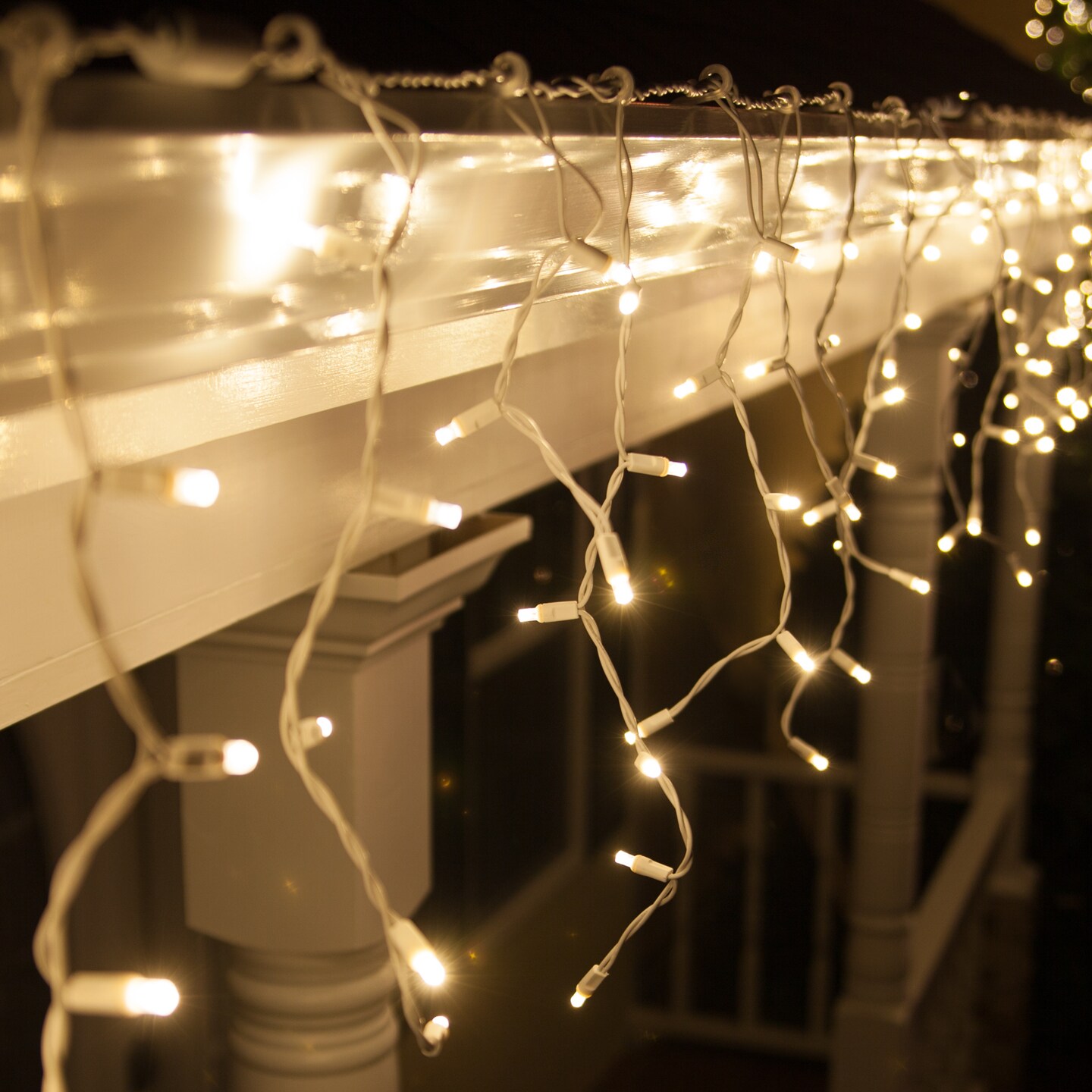 70 Warm White Twinkle 5mm LED Icicle Light Set with White Wire