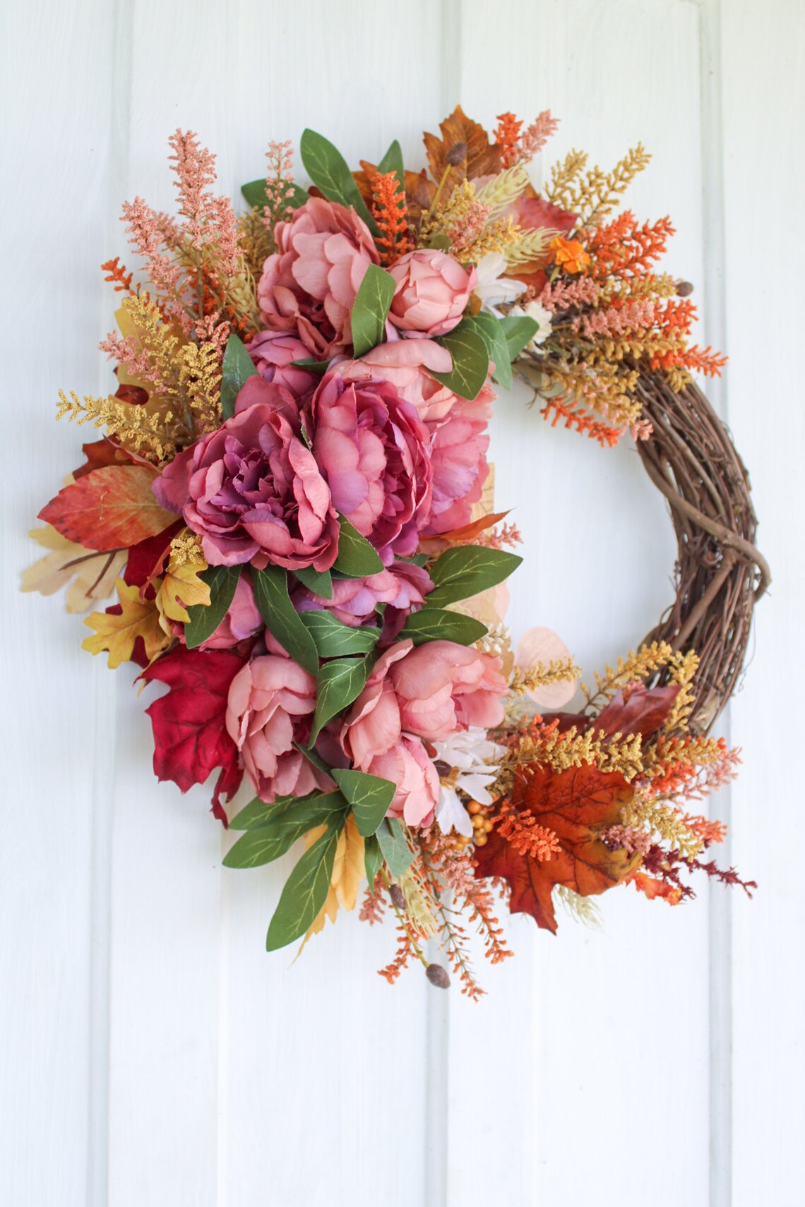 Pink Peony, Dusty Rose Eucalyptus, orange and yellow seeds