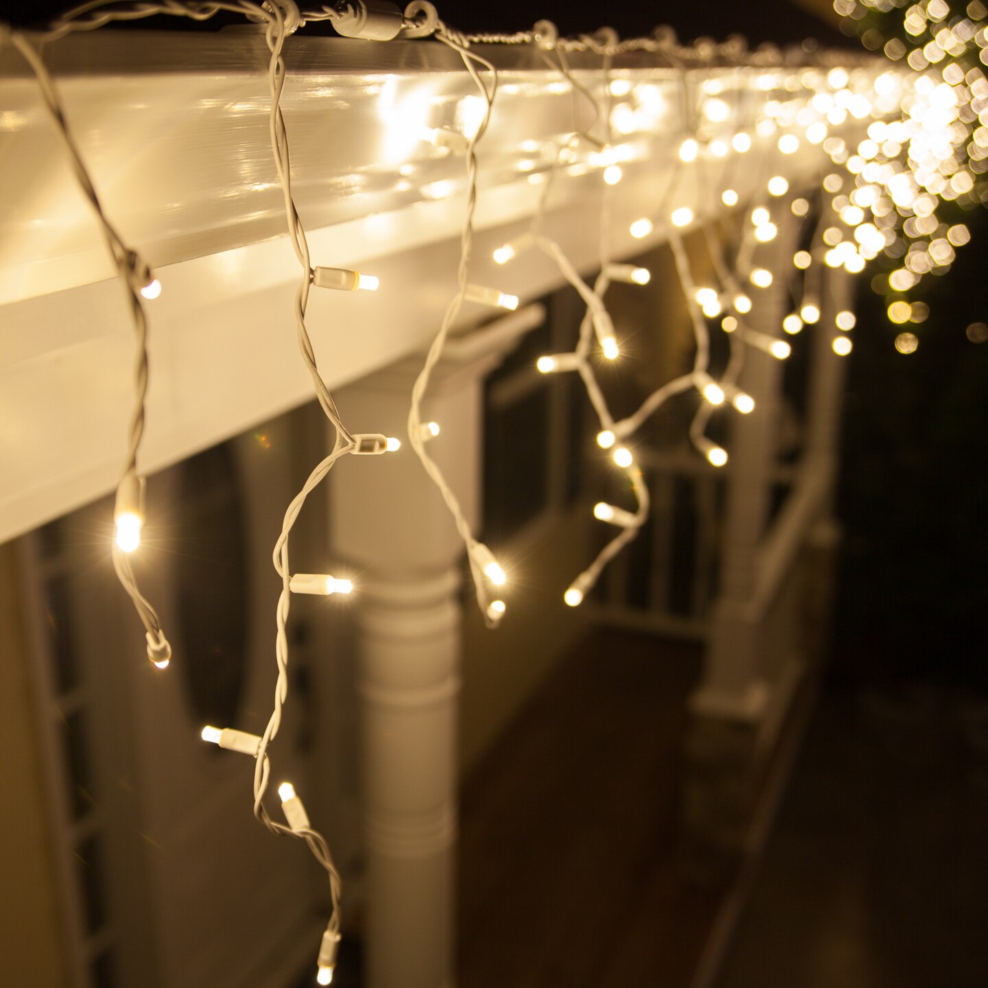 70 Warm White Twinkle 5mm LED Icicle Light Set with White Wire