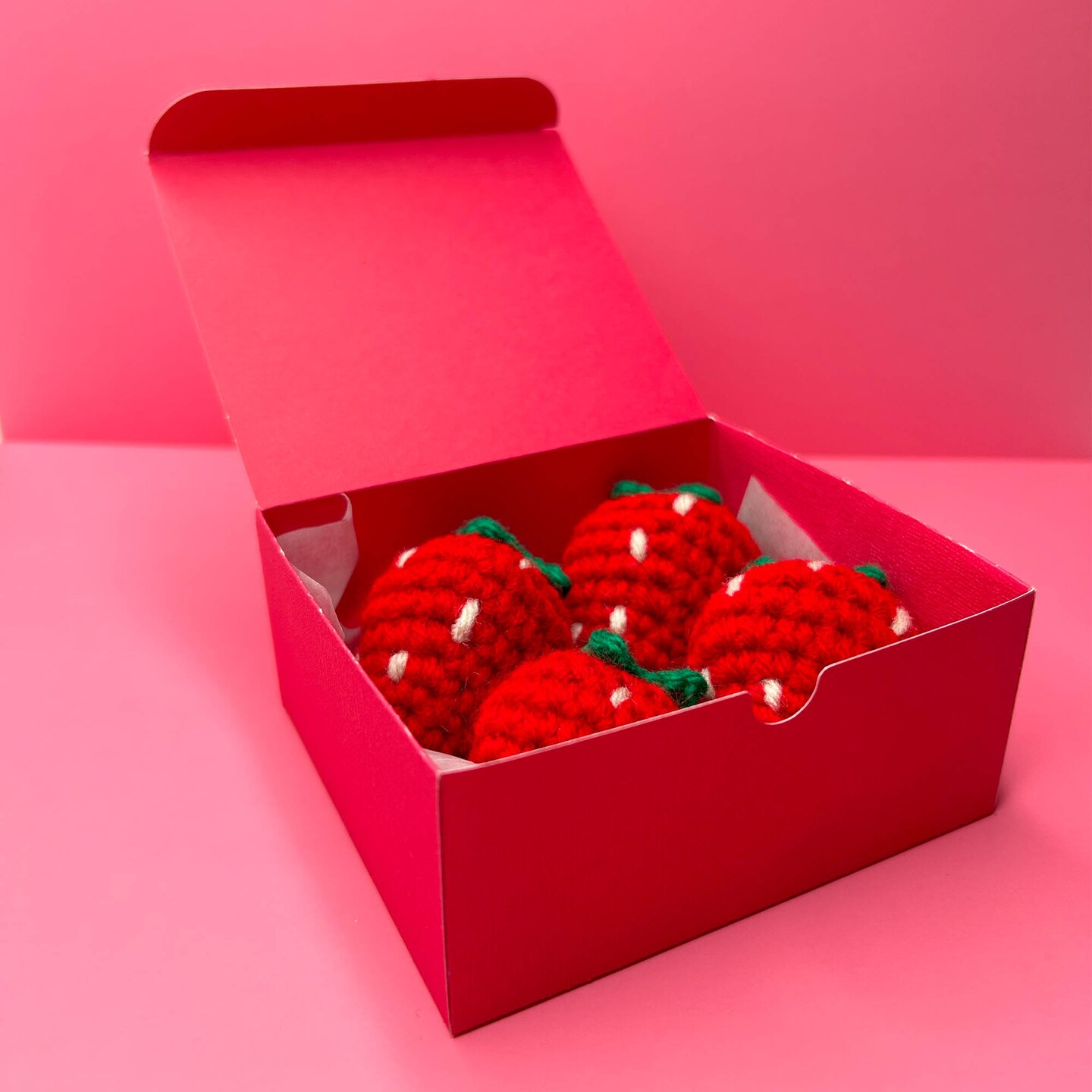 product name is Box of Crochet Strawberries Amigurumi