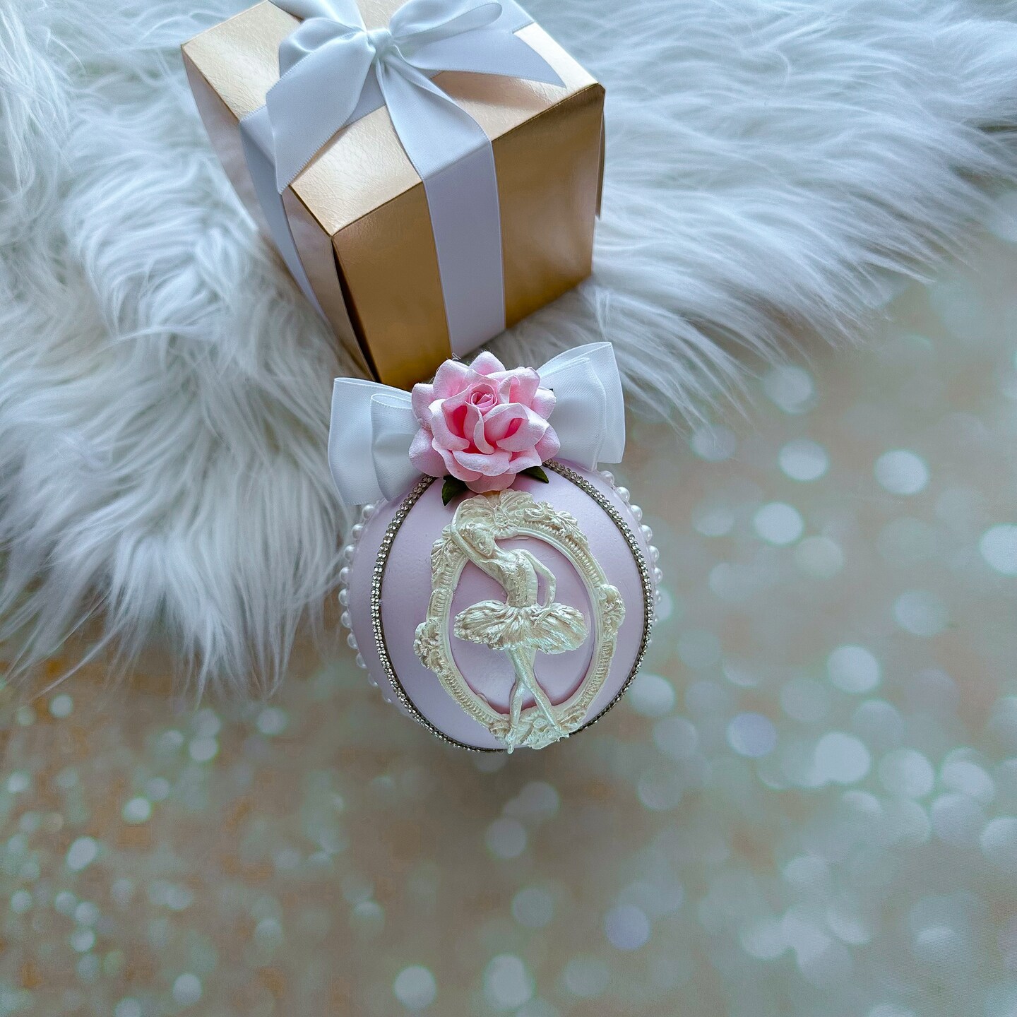 Fun, festive, handmade Christmas tree ornament of a woman's pink