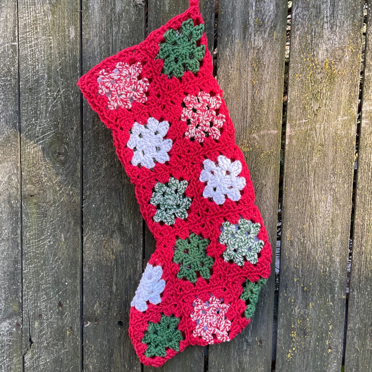product name is Red Granny Square Christmas Stocking