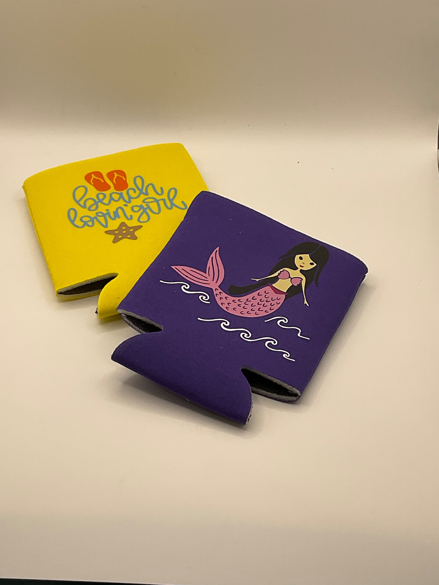 product name is Koozies, beverage Koozies