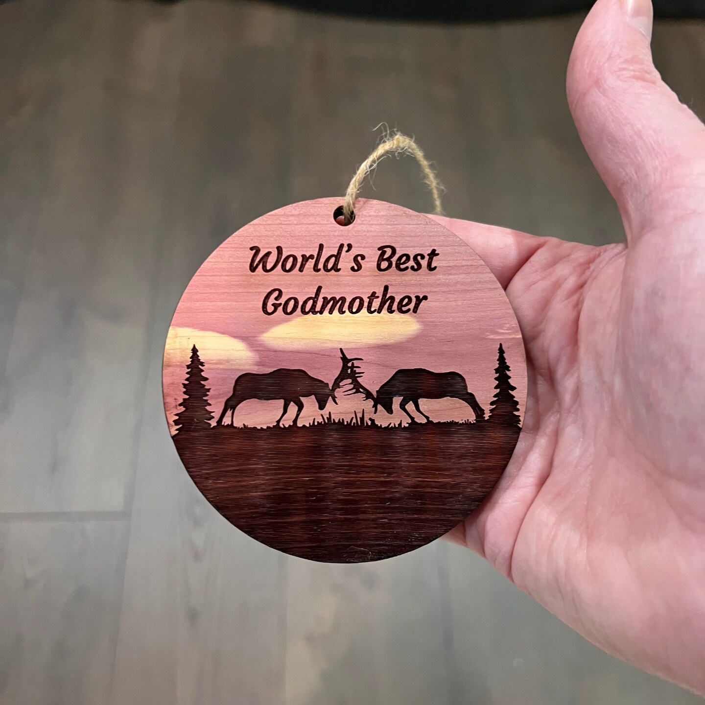 Worlds Best Godmother Elk Battle - Cedar Ornament Worlds Best Godmother Elk Battle - Cedar Ornament
