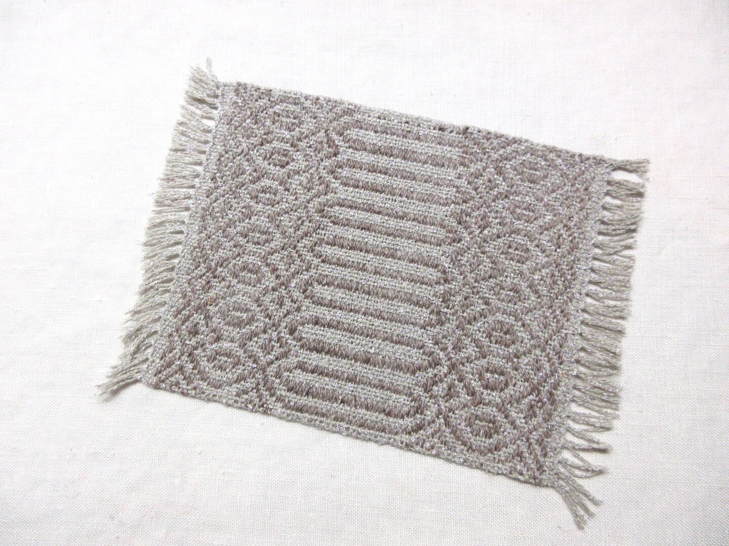 Handwoven heirloom miniature dollhouse rug, alter mat or table mat, woven in a Rosepath twill pattern. Alpaca wool, cotton silk. 8" by 5" product 5