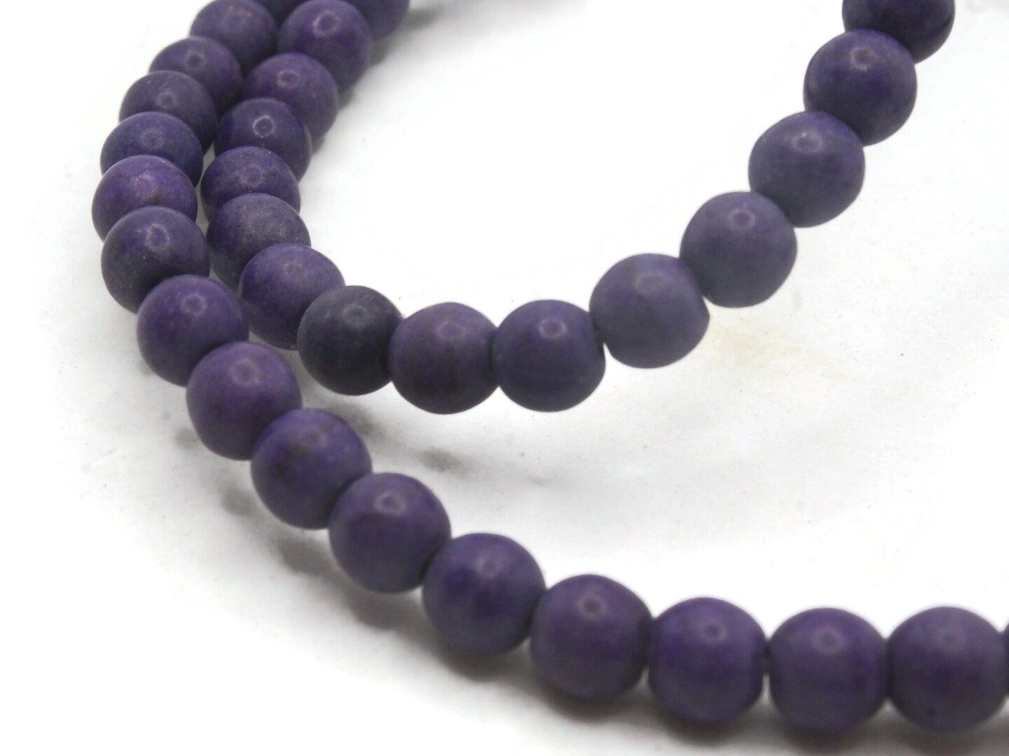 73 6mm Round Purple Dyed Synthetic Turquoise Gemstone Beads