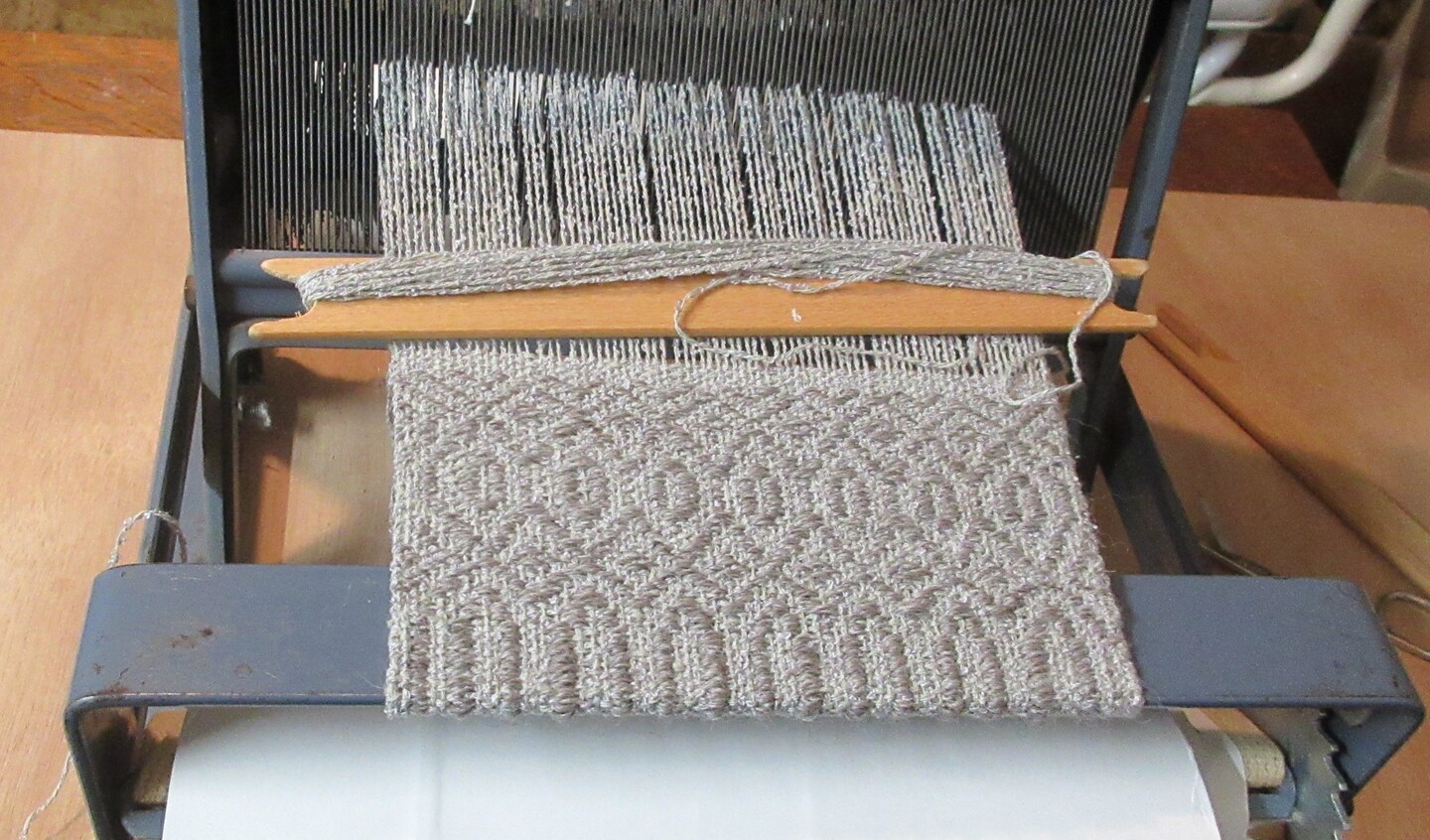 Handwoven heirloom miniature dollhouse rug, alter mat or table mat, woven in a Rosepath twill pattern. Alpaca wool, cotton silk. 8" by 5" product 6